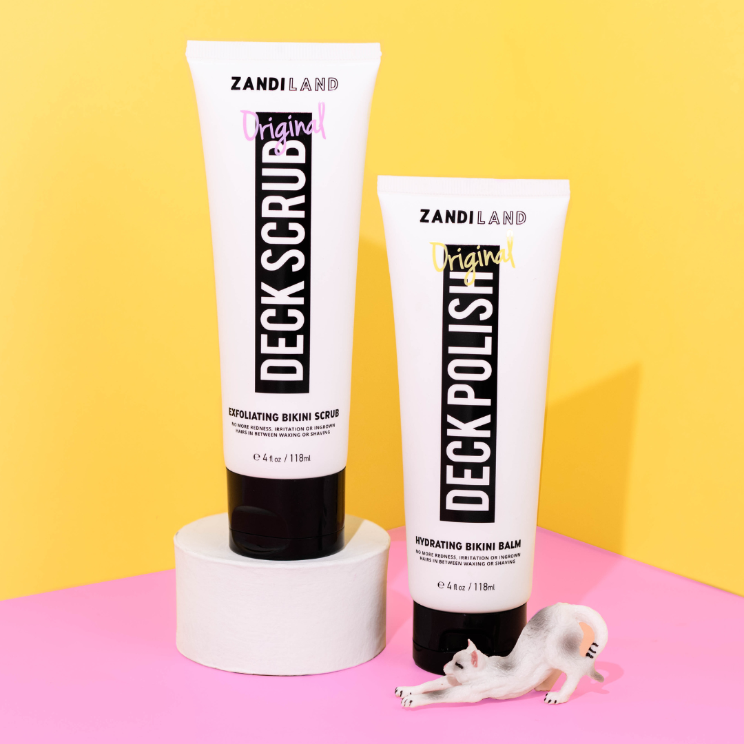 Two tubes of Zandiland skincare products against a yellow and pink background.